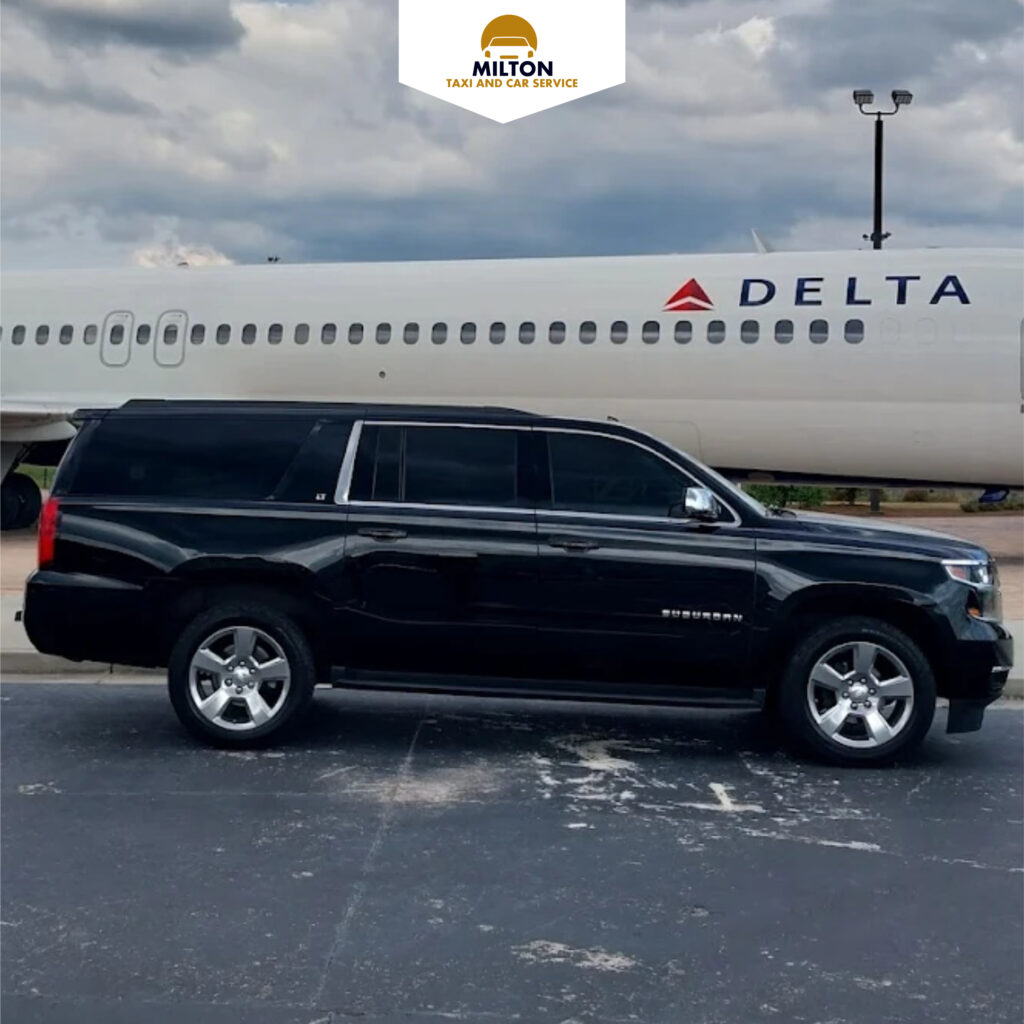 Milton Taxi and Car Service airport transfer vehicle at international airport
